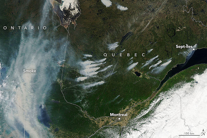 Imagem de satlite mostra rastros de fumaa saindo de vrios pontos de incndio em Quebec, no Canad, dia 3 de junho. Crdito: Satlite Aqua/NASA