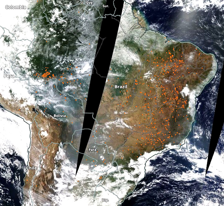 Imagem do satélite TERRA, da Nasa, mostra centenas de focos de fogo sobre o Brasil na segunda-feira, dia 6. Crédito: Wolrdview/NASA.